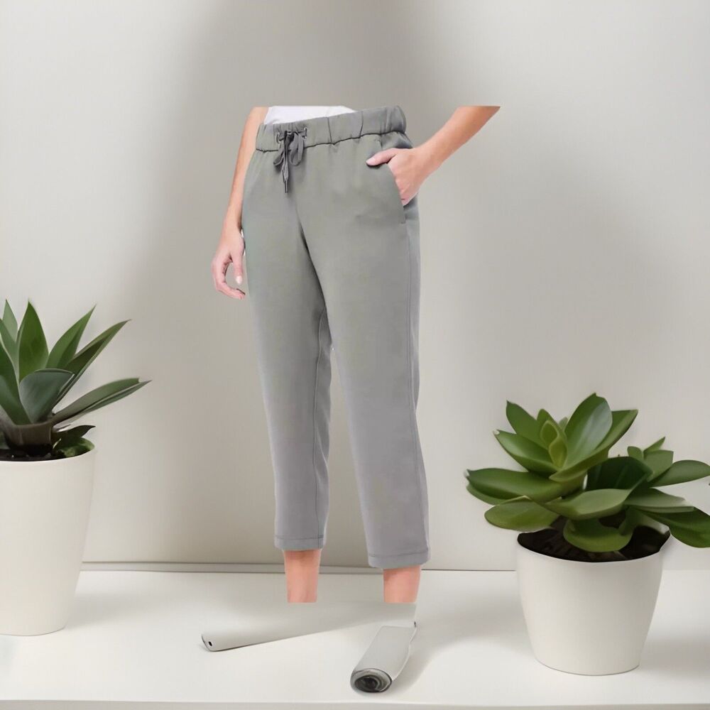 LULULEMON On The Fly Crop Woven PANT 23" Ins Sage Green sz 8 Pants